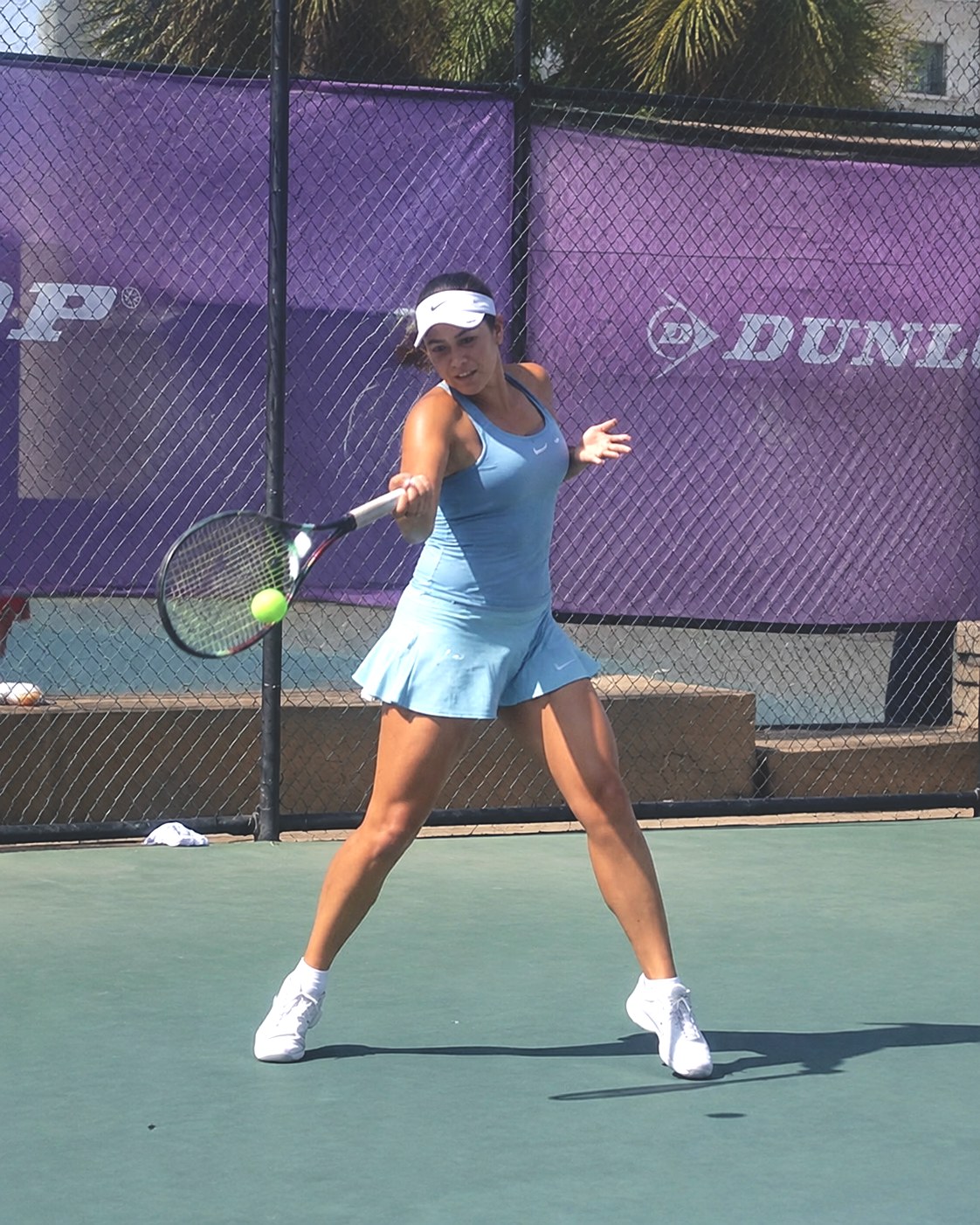 Player hitting a forehand
